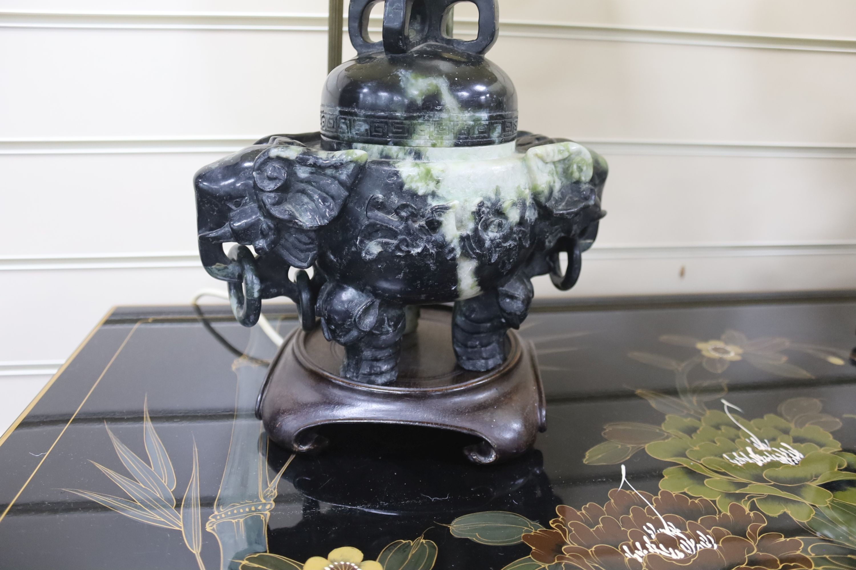 A pair of mid 20th century Chinese hardstone tripod censers on lamp stands, including stand 30 cms high.